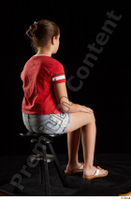  Ruby  1 dressed flip flop jeans shorts red t shirt sitting whole body 0004.jpg